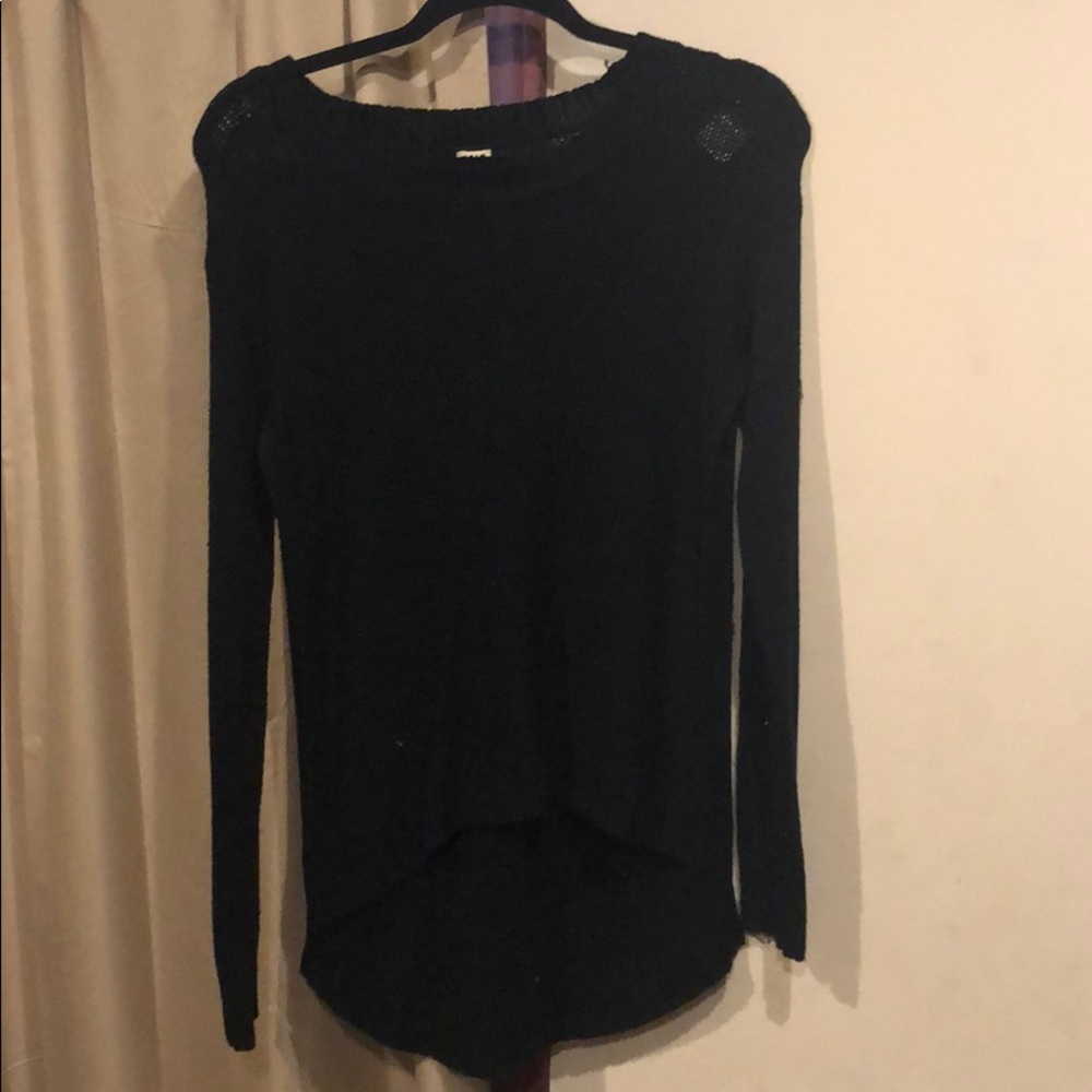 black knit sweater with side slits